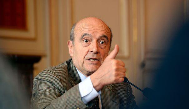alain-juppe-lors-d-une-conference-de-pre