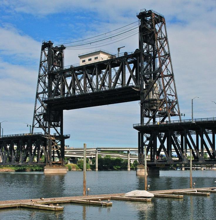 1024px-Portland_Steel_Bridge_with_lift_span_raised_-_viewed_from_west.jpg