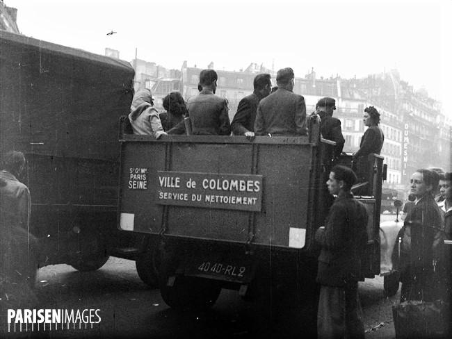 719261569_Grvedestransports.Parisienstransportsdansdesvoituresduservicedunettoiement.13octobre1947.jpg.3aee03d4d47bca9dc1237ff2fdfadb07.jpg