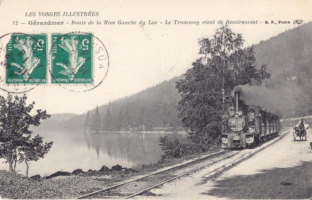 GERARDMER_-_Route_de_la_Rive_Gauche_du_Lac_-_Le_Tramway_vient_de_Remiremont.thumb.jpg.d55cbf17a7f37197c21ec4fed556c450.jpg